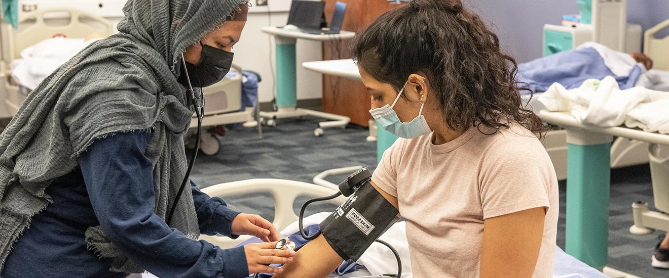 Students working with medical equipment